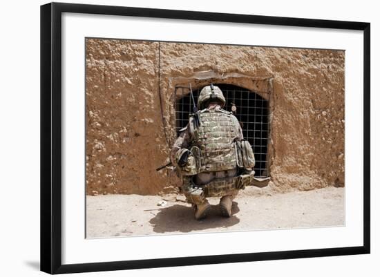 Soldier Searches a Compound in Afghanistan-null-Framed Photographic Print