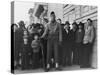 Soldier Standing Guard of Japanese American Citizens Awaiting Transport to Relocation Camps-Dorothea Lange-Stretched Canvas