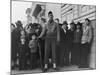 Soldier Standing Guard of Japanese American Citizens Awaiting Transport to Relocation Camps-Dorothea Lange-Mounted Photographic Print