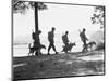 Soldiers and their Dogs Walking along the Shore-null-Mounted Photographic Print