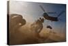 Soldiers in the Dust of a Chinook Helicopter Hauling a Humvee, April 2011-null-Stretched Canvas