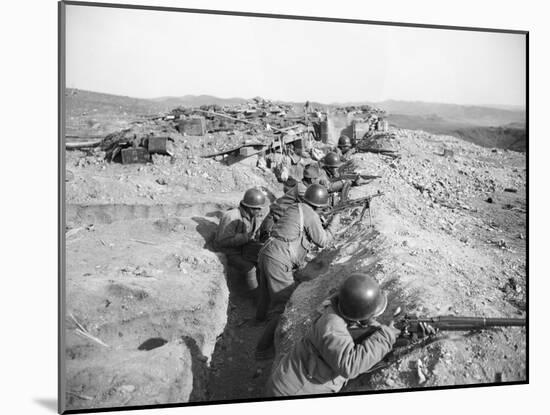Soldiers in Trenches Firing Rifles-null-Mounted Photographic Print