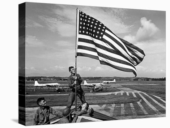 Soldiers Raising American Flag at Atsugi Airbase as First American Occupation Forces Arrive-Carl Mydans-Stretched Canvas