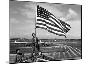 Soldiers Raising American Flag at Atsugi Airbase as First American Occupation Forces Arrive-Carl Mydans-Mounted Photographic Print