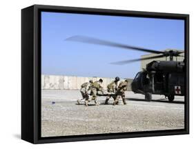 Soldiers Rush a Simulated Casualty to a UH-60 Blackhawk Helicopter-Stocktrek Images-Framed Stretched Canvas