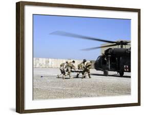 Soldiers Rush a Simulated Casualty to a UH-60 Blackhawk Helicopter-Stocktrek Images-Framed Photographic Print