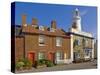 Sole Bay Inn Pub with Southwold Lighthouse Behind, Southwold, Suffolk, England, United Kingdom-Neale Clark-Stretched Canvas