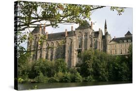 Solesmes Benedictine Abbey overlooking the Sarthe River, Solesmes, Sarthe, France-Godong-Stretched Canvas