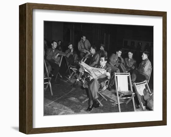 Songwriter Irving Berlin Reading Newspaper as Others Sit around Talking-null-Framed Photographic Print