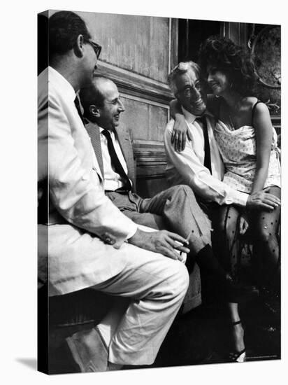 Sophia Loren Sitting on Director Vittorio de Sica's Lap During Filming "Marriage, Italian Style"-Alfred Eisenstaedt-Stretched Canvas