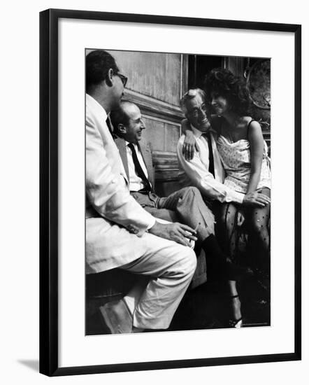 Sophia Loren Sitting on Director Vittorio de Sica's Lap During Filming "Marriage, Italian Style"-Alfred Eisenstaedt-Framed Premium Photographic Print