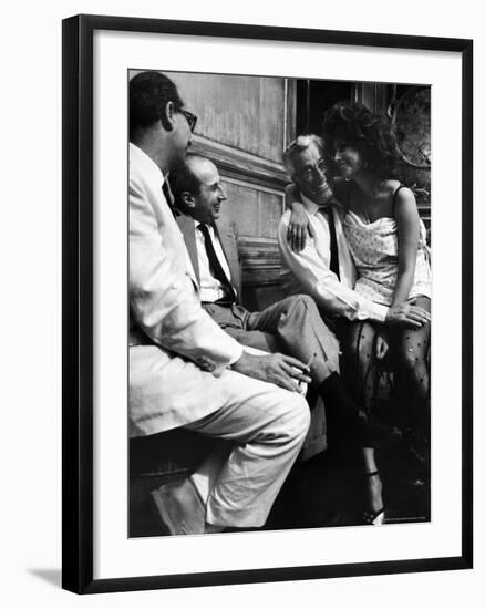 Sophia Loren Sitting on Director Vittorio de Sica's Lap During Filming "Marriage, Italian Style"-Alfred Eisenstaedt-Framed Premium Photographic Print