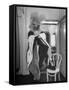 Soprano Patrice Munsel Costumed as Notary for Cosi Fan Tutte, Pulling onGloves in Dressing Room-Peter Stackpole-Framed Stretched Canvas