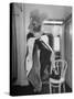 Soprano Patrice Munsel Costumed as Notary for Cosi Fan Tutte, Pulling onGloves in Dressing Room-Peter Stackpole-Stretched Canvas