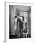 Soprano Patrice Munsel Costumed as Notary for Cosi Fan Tutte, Pulling onGloves in Dressing Room-Peter Stackpole-Framed Premium Photographic Print