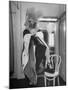 Soprano Patrice Munsel Costumed as Notary for Cosi Fan Tutte, Pulling onGloves in Dressing Room-Peter Stackpole-Mounted Premium Photographic Print