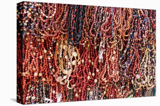 South America, Brazil, Salvador. Close-up of beads made of acai berries.-Alida Latham-Stretched Canvas