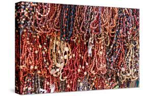 South America, Brazil, Salvador. Close-up of beads made of acai berries.-Alida Latham-Stretched Canvas