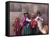 South America, Peru, Cusco. Quechua People in Front of An Inca Wall, Holding a Lamb and a Llama-Alex Robinson-Framed Stretched Canvas