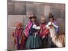 South America, Peru, Cusco. Quechua People in Front of An Inca Wall, Holding a Lamb and a Llama-Alex Robinson-Mounted Premium Photographic Print