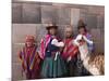 South America, Peru, Cusco. Quechua People in Front of An Inca Wall, Holding a Lamb and a Llama-Alex Robinson-Mounted Photographic Print