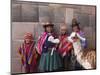 South America, Peru, Cusco. Quechua People in Front of An Inca Wall, Holding a Lamb and a Llama-Alex Robinson-Mounted Photographic Print