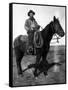 South Dakota - A Dakota Cowboy on Horseback-Lantern Press-Framed Stretched Canvas