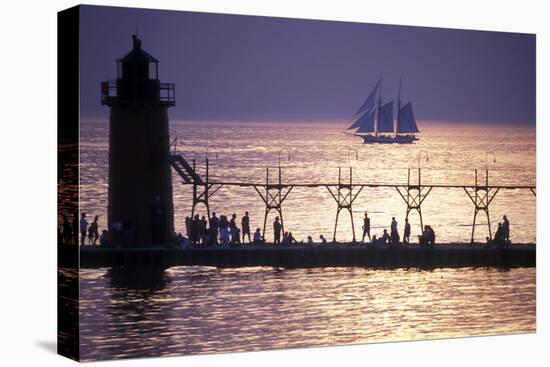 South Haven Lighthouse and pier at dusk, South Haven, Michigan, USA-null-Stretched Canvas