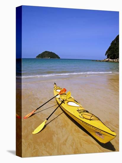 South Island, Nelson, Kayak on Onetahuti Beach in Abel Tasman National Park, New Zealand-Christian Kober-Stretched Canvas