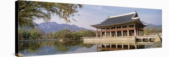South Korea, Seoul, Kyongheru, View of Traditional Architecture on a Lake-null-Stretched Canvas