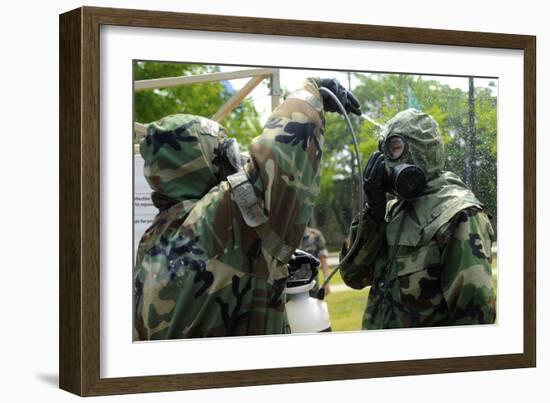 South Korean Airmen Assist in Mask Washing Decontamination-null-Framed Photographic Print