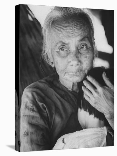 South Vietnamese Refugee Holding Small Child-Carl Mydans-Stretched Canvas