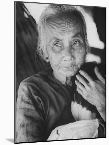 South Vietnamese Refugee Holding Small Child-Carl Mydans-Mounted Photographic Print