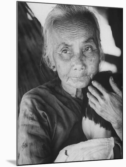 South Vietnamese Refugee Holding Small Child-Carl Mydans-Mounted Photographic Print