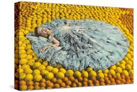 Southern Belle Lying on Oranges, Florida-null-Stretched Canvas