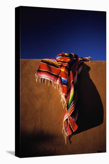 Southwest Blanket on Adobe Wall-Jim Zuckerman-Stretched Canvas