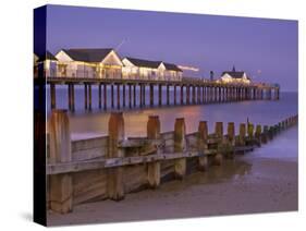 Southwold Pier and Wooden Groyne at Sunset, Southwold, Suffolk, England, United Kingdom, Europe-Neale Clark-Stretched Canvas