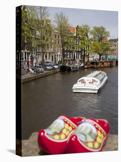 Souvenir Clogs and Canal, Amsterdam, Holland, Europe-Frank Fell-Stretched Canvas