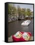 Souvenir Clogs and Canal, Amsterdam, Holland, Europe-Frank Fell-Framed Stretched Canvas