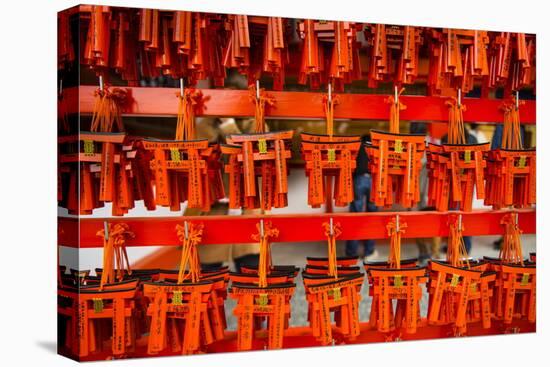 Souvenirs of the Endless Red Gates of Kyoto's Fushimi Inari Shrine, Kyoto, Japan, Asia-Michael Runkel-Stretched Canvas