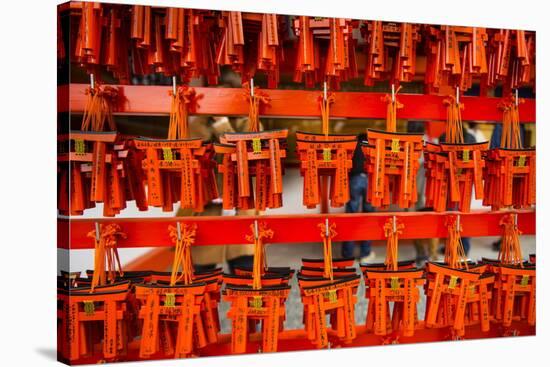 Souvenirs of the Endless Red Gates of Kyoto's Fushimi Inari Shrine, Kyoto, Japan, Asia-Michael Runkel-Stretched Canvas