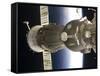 Soyuz Spacecraft Backdropped by Earth-null-Framed Stretched Canvas