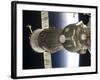 Soyuz Spacecraft Backdropped by Earth-null-Framed Photographic Print