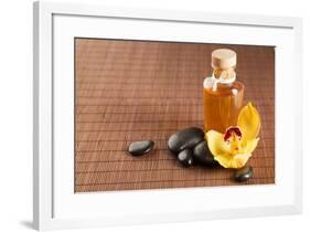 Spa, Health and Beauty Concept - Closeup of Essential Oil, Massage Stones and Orchid Flower-dolgachov-Framed Photographic Print