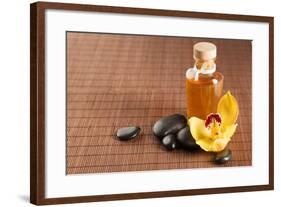 Spa, Health and Beauty Concept - Closeup of Essential Oil, Massage Stones and Orchid Flower-dolgachov-Framed Photographic Print