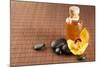 Spa, Health and Beauty Concept - Closeup of Essential Oil, Massage Stones and Orchid Flower-dolgachov-Mounted Photographic Print