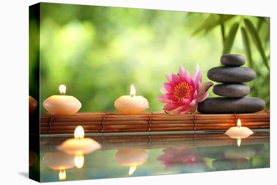 Spa Still Life with Burning Candles,Zen Stone and Bamboo Mat Reflected in a Serenity Pool-Sofiaworld-Stretched Canvas