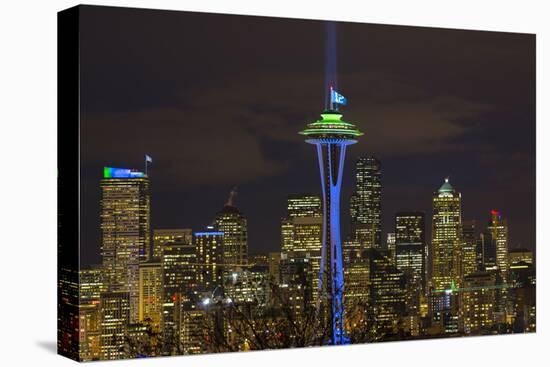 Space Needle with Seahawk colors and 12th man flag. Washington, USA-Jamie & Judy Wild-Stretched Canvas