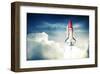 Space Shuttle Above Clouds-null-Framed Art Print