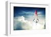 Space Shuttle Above Clouds-null-Framed Art Print